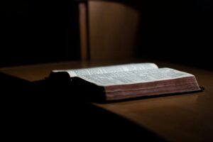 Open Bible with highlighted passages representing what does fulfillment mean in the Bible