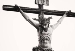 Jesus on the cross symbolizing why did Jesus have to die according to Hebrews 2